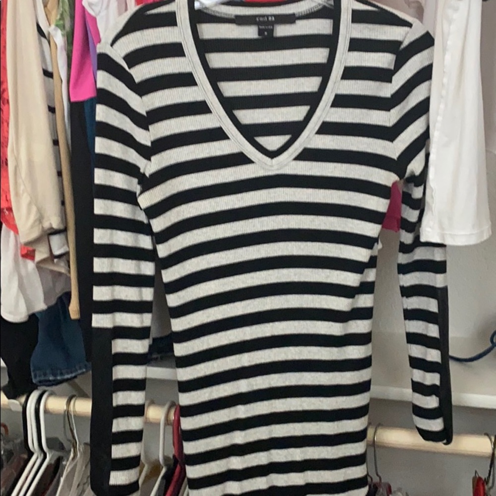 V-neck blouse with leather detail on sleeve
